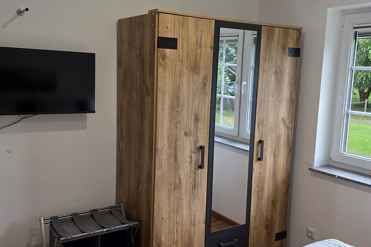 Bedroom 2, television and wardrobe